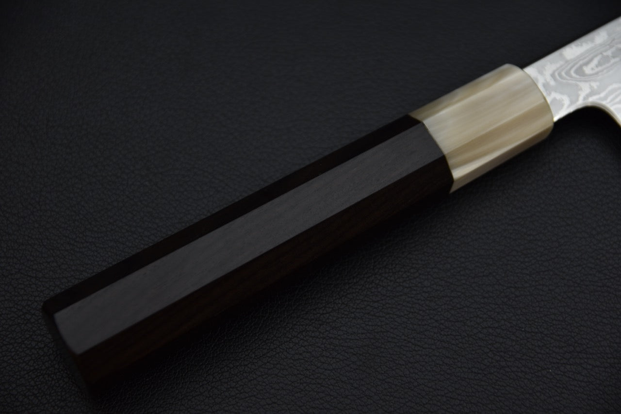 Talon de lame du kiritsuke japonais SPG Strix, vue rapprochée