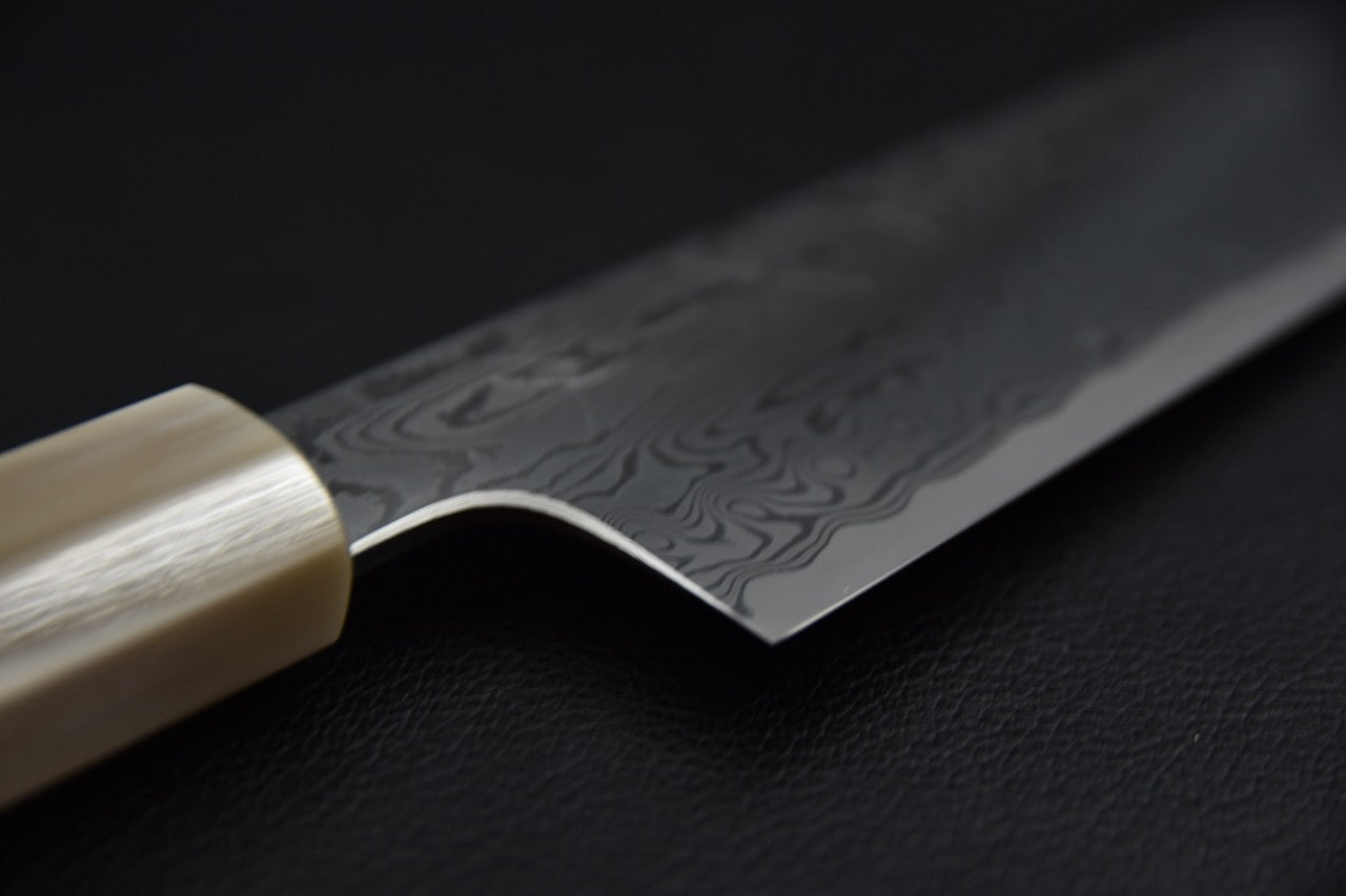 Couteau japonais kiritsuke 210 mm posé à plat, vue de dessus