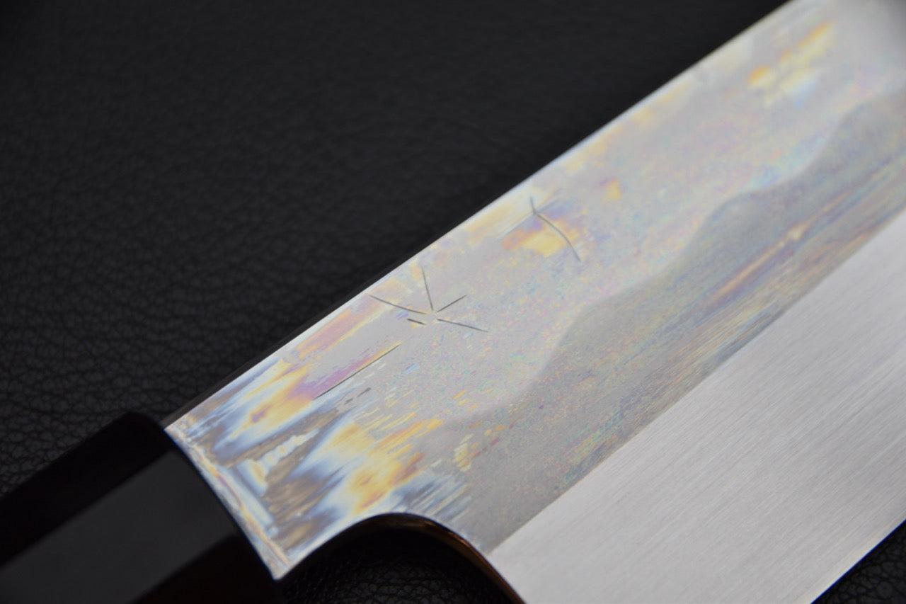 Hitohira Togashi gyuto 240 mm couteau japonais — détail du tranchant et ligne hagane