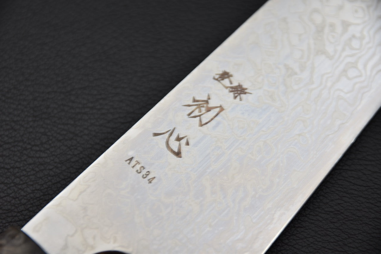 Marquage sur la lame ATS-34 du couteau japonais gyuto Hatsukokoro Ginga
