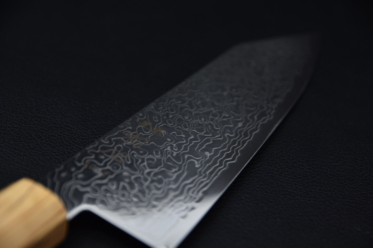 Détail du motif damas sur la lame du couteau japonais SG2 Ryuhyō — Stay Sharp Montréal.