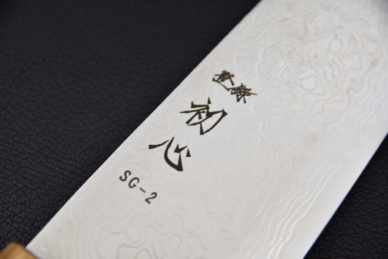 Inscription et gravure sur la lame du couteau japonais Bunka SG2 Ryuhyō — Stay Sharp Montréal.