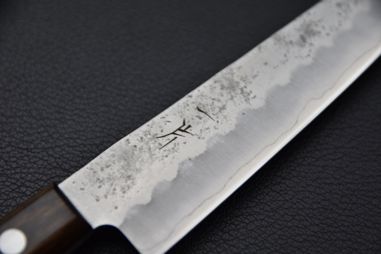 couteau japonais lame nashiji martelée et manche ergonomique Pakka

