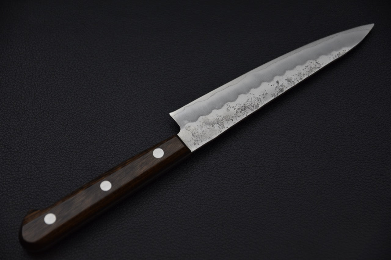 couteau japonais détail du raccord lame-manche nue sans mitre

