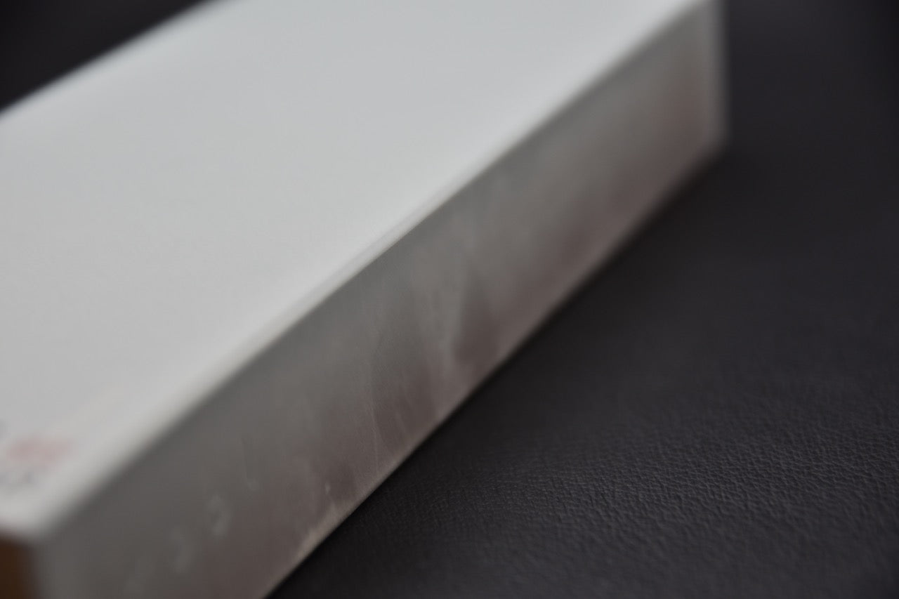 Texture latérale de la pierre à aiguiser Hitohira GC 1000, grain 1000, tendre