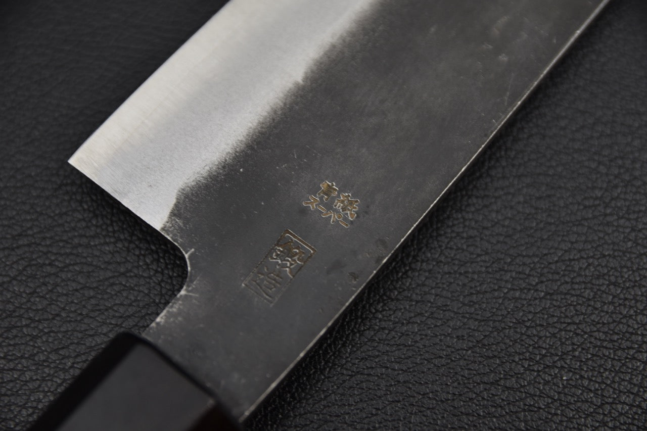 Couteau japonais Bunka 180mm, manche en noyer de forme octogonale.