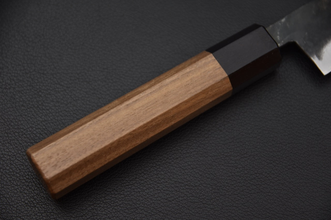 couteau japonais tranche parfaite viande poisson grâce à la lame longue et tranchante