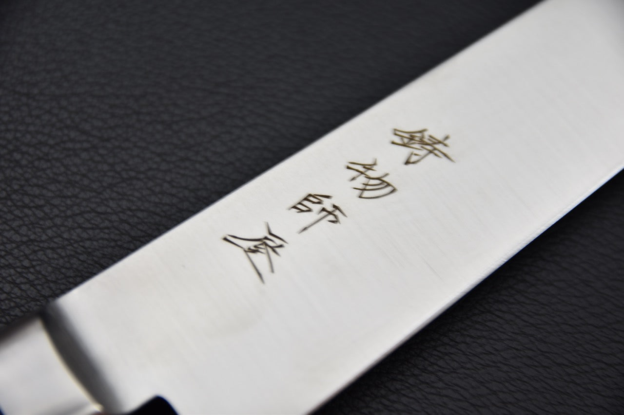 couteau japonais lame avec biseau fin pour découpe précise