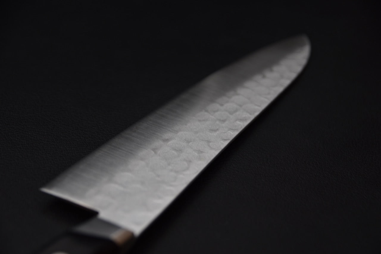 Manche pakka western riveté du couteau japonais Hitohira Imojiya Kuma.