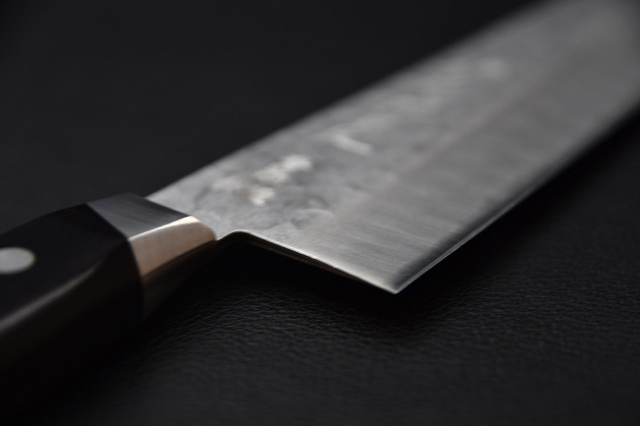 Jonction bolster et début de lame du couteau japonais gyuto 200mm.