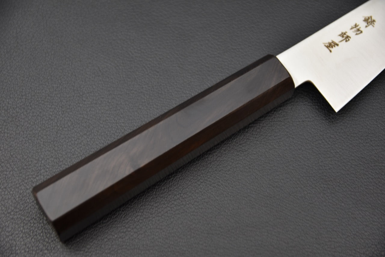 "Manche octogonal en bois d’ébène du couteau japonais Honesuki Kaku 150 mm."