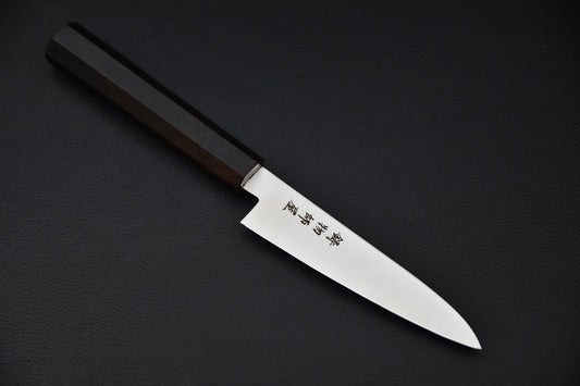Couteau japonais Hitohira Imojiya TH Petty 120 mm, lame inox, manche Wa en ébène, vue de profil.