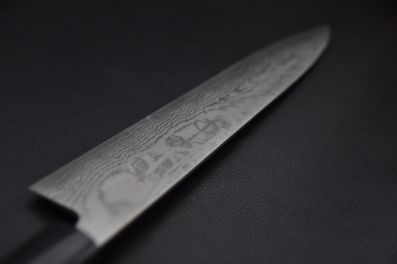 Détail du motif damassé sur la lame du Sujihiki VG-10