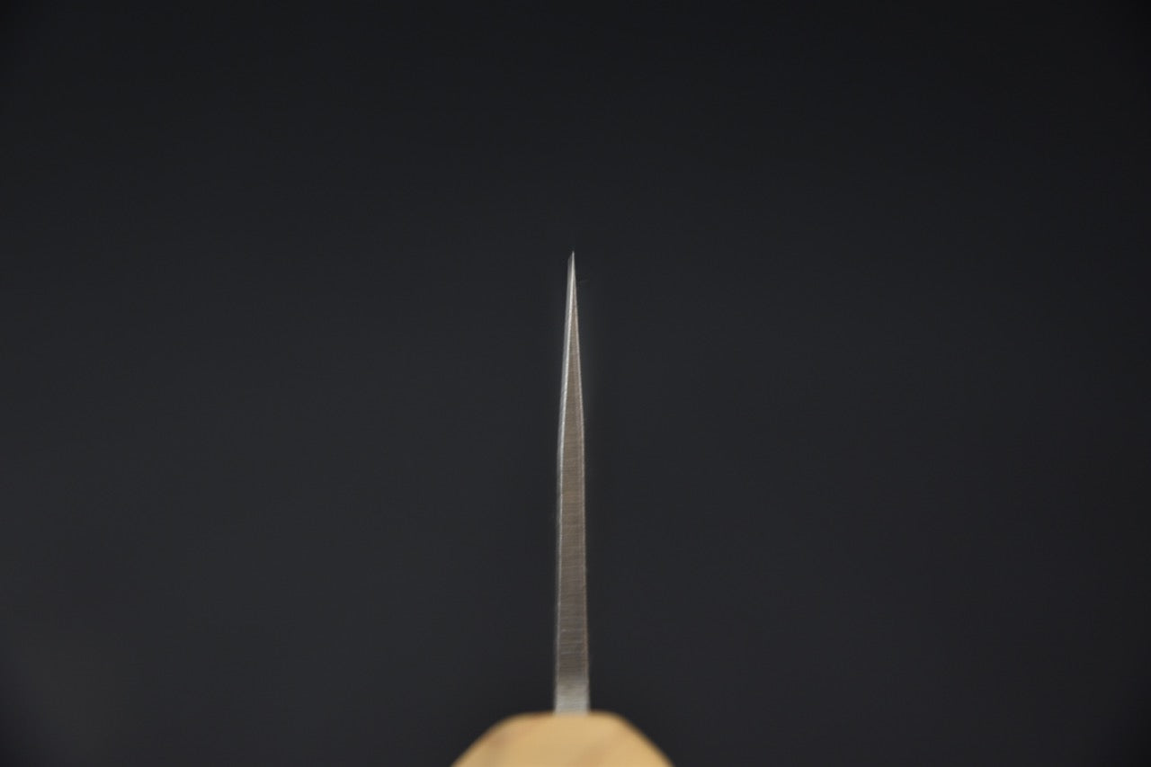 Vue de la lame depuis le dos montrant l’émouture fine du couteau japonais Hitohira TD Aogami #2 Gyuto.