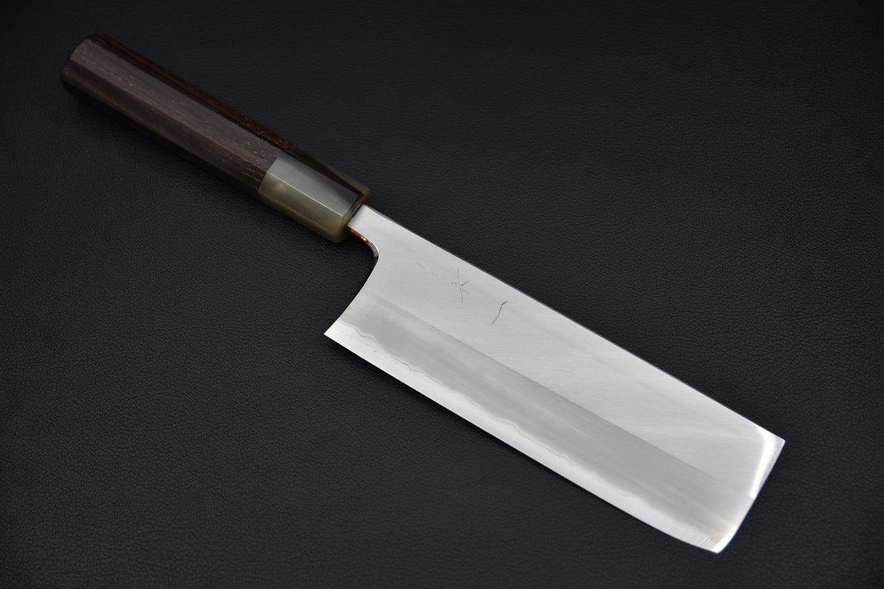 Japanese nakiri knife with a polished rectangular blade and dark wooden handle, displayed on a black background.