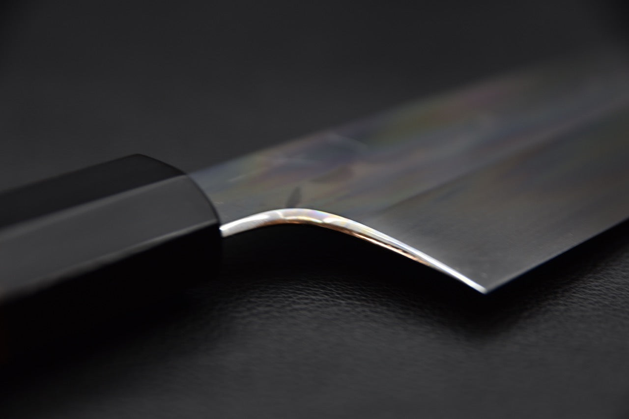 Autre angle du manche Ziricote montrant le contraste avec la mitre noire