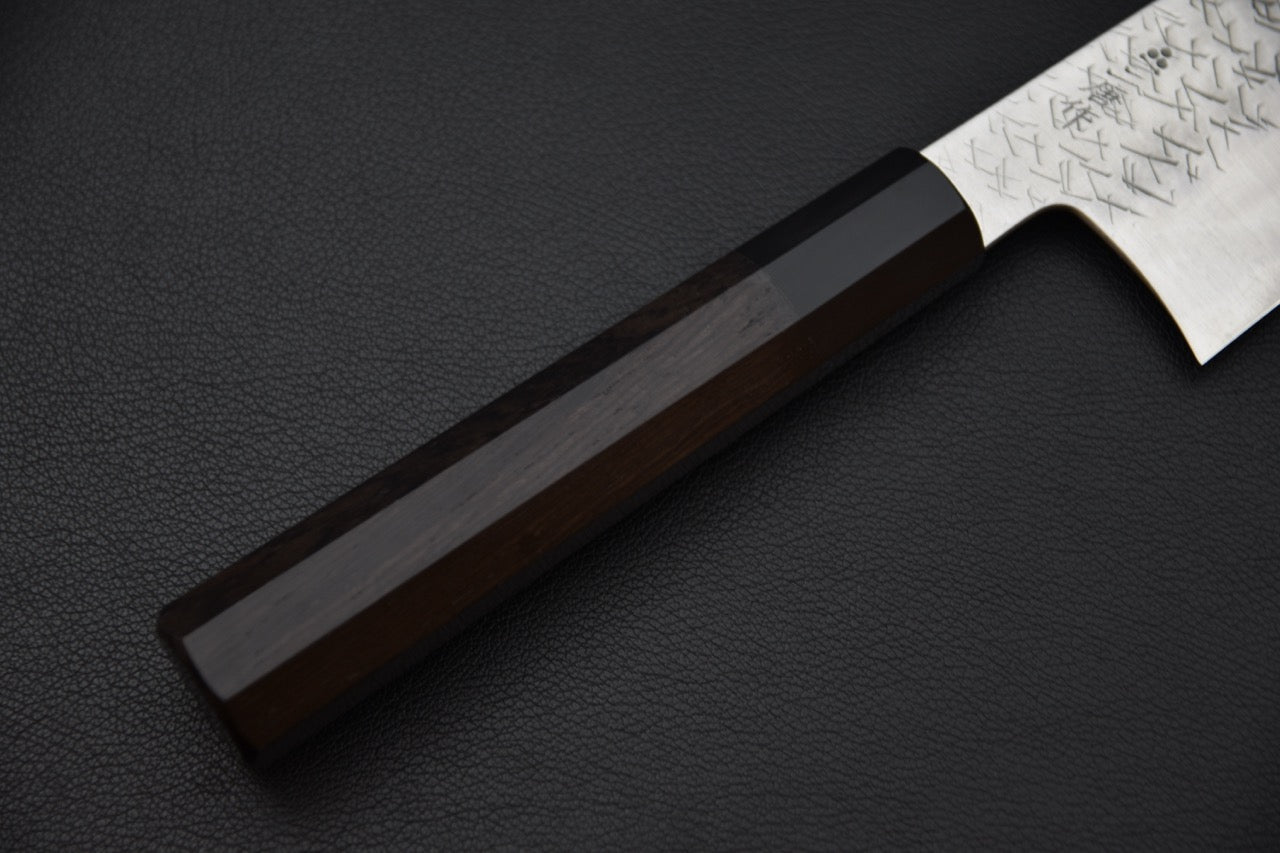 Couteau japonais gyuto Nigara Hamono, gros plan du manche octogonal en ébène