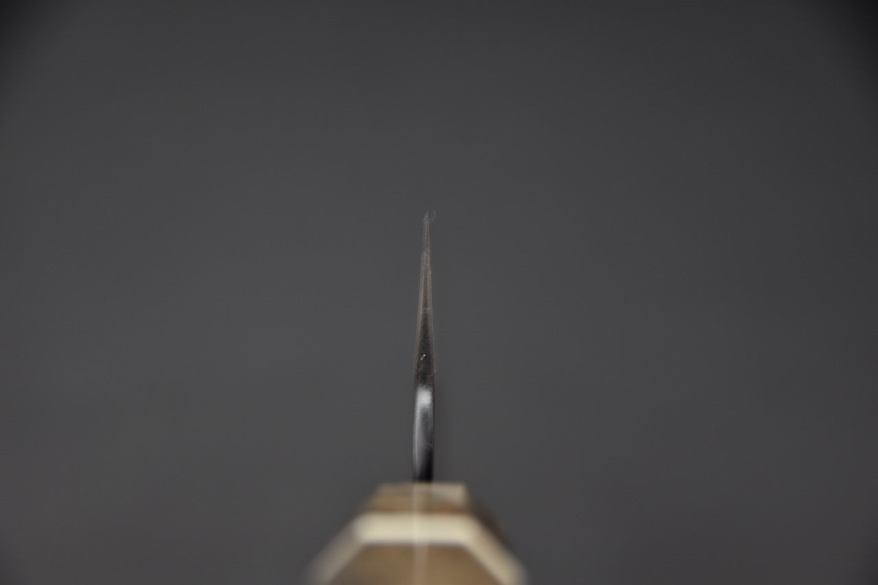 Vue du tranchant et de la géométrie d’un couteau japonais bunka SG2 — Stay Sharp Montréal