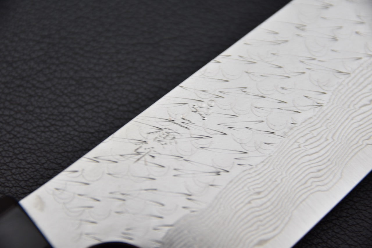 tranchant du couteau japonais Sujihiki 270 mm vu en angle