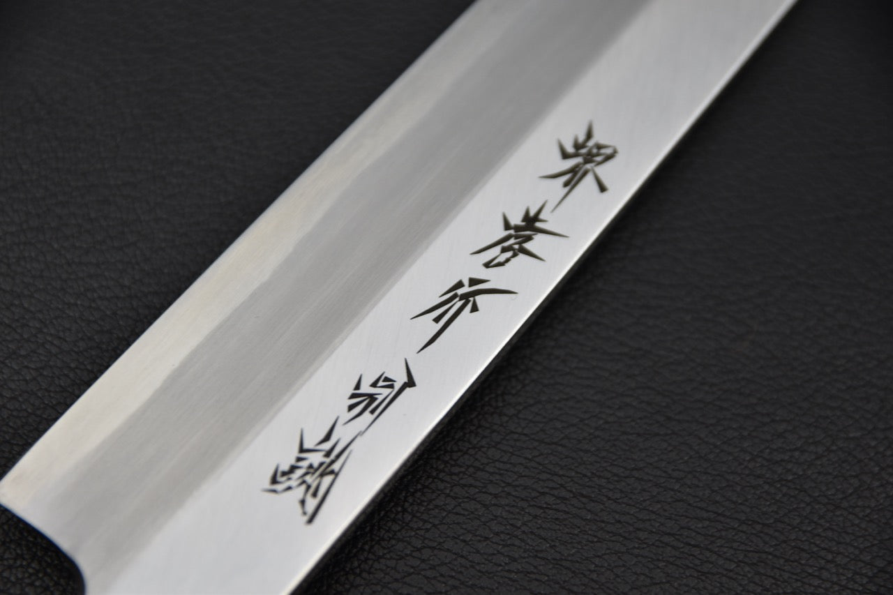 Détail de la gravure sur la lame du couteau japonais yanagiba Sakai Takayuki Tokucho