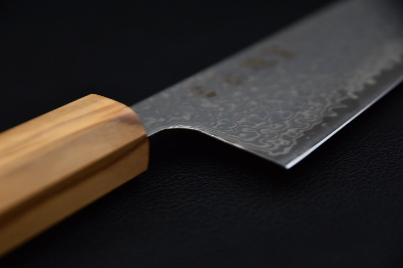 Hatsukokoro santoku SLD — vue en plongée, surface de lame, couteau japonais