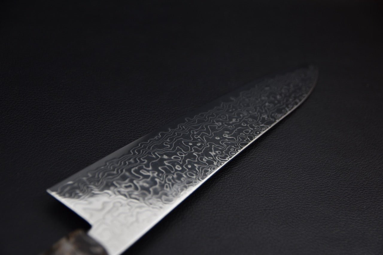 Hatsukokoro gyuto 210 mm SG2 — détail du talon, motif damas côté tranchant