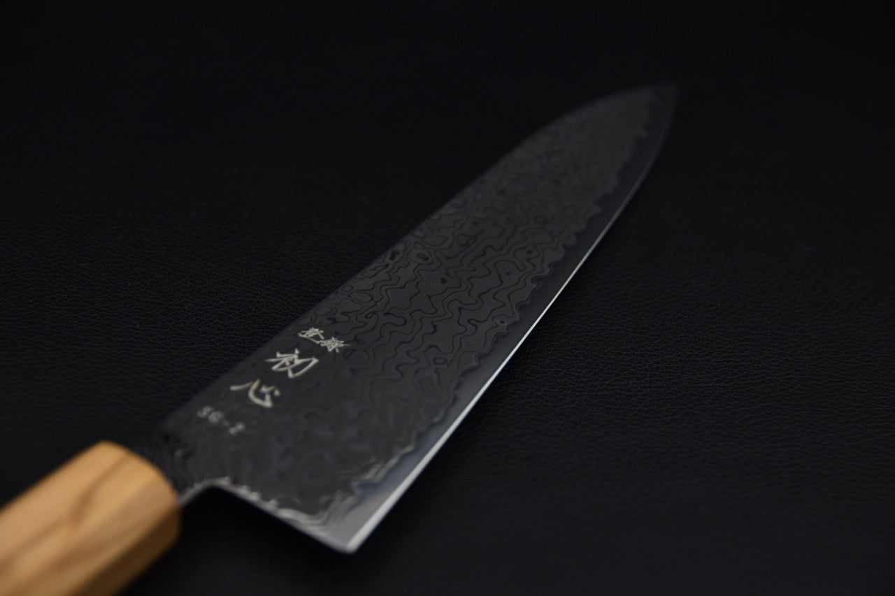 Hatsukokoro gyuto 240 mm — profil de la lame, construction sanmai visible