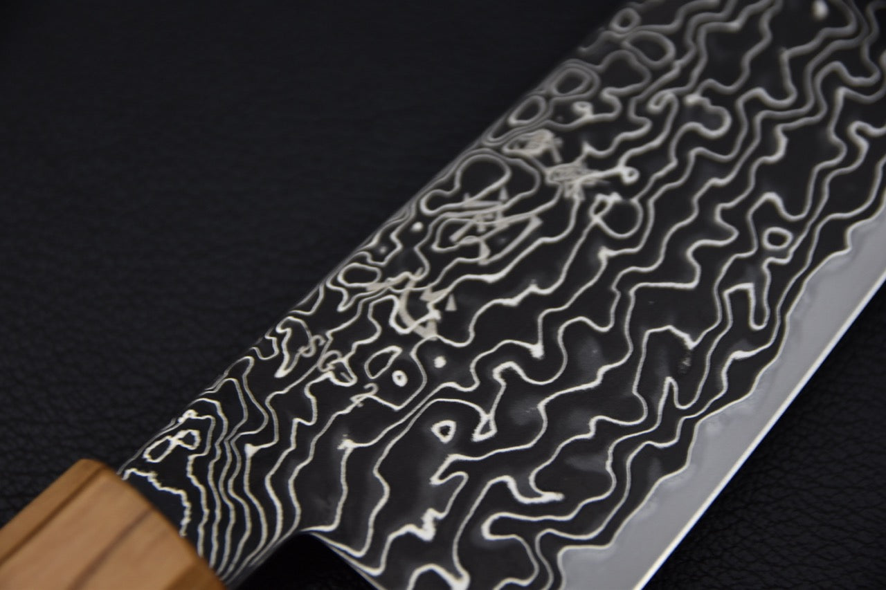 Gyuto japonais Hatsukokoro — détail du tranchant en acier SG2