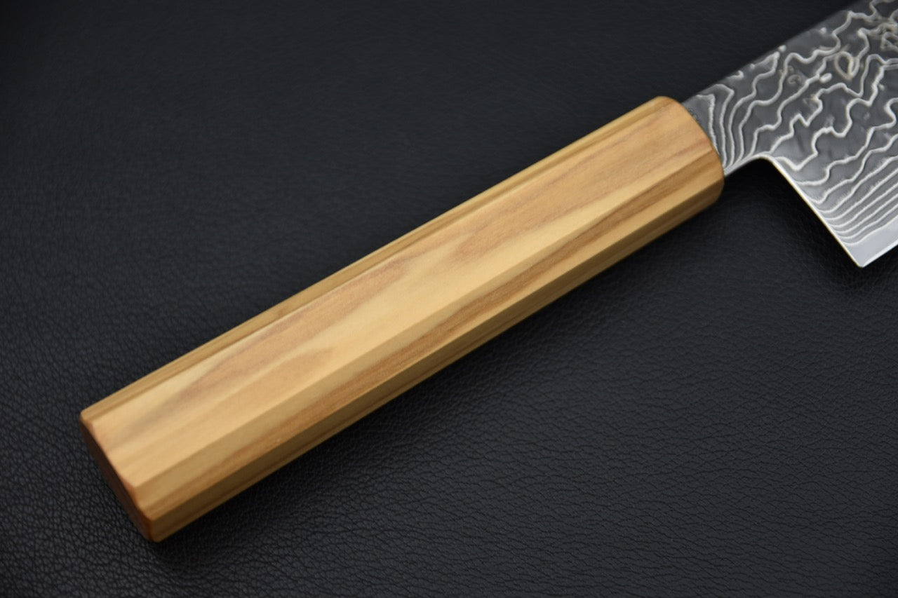 Hatsukokoro santoku SG2 — détail de la virole et jonction manche-lame, couteau japonais
