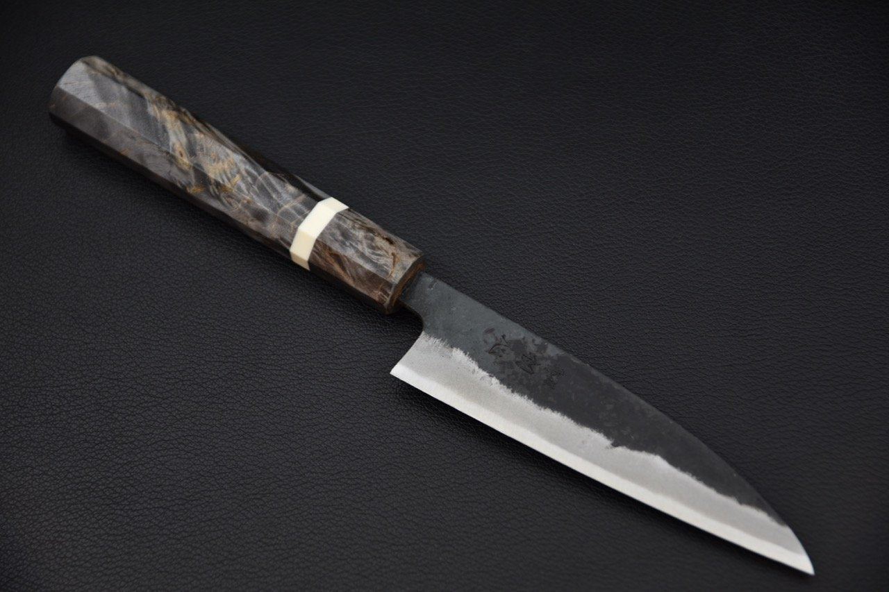 Couteau japonais avec manche en bois sombre