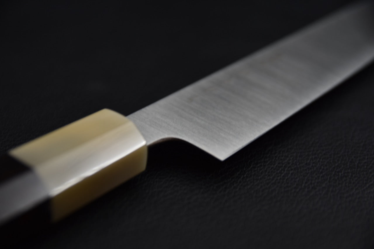 hitohira-ah-inox-petty-210mm-ebene-6.jpg,"Petty couteau japonais 210 mm — manche en ébène, vue latérale"
