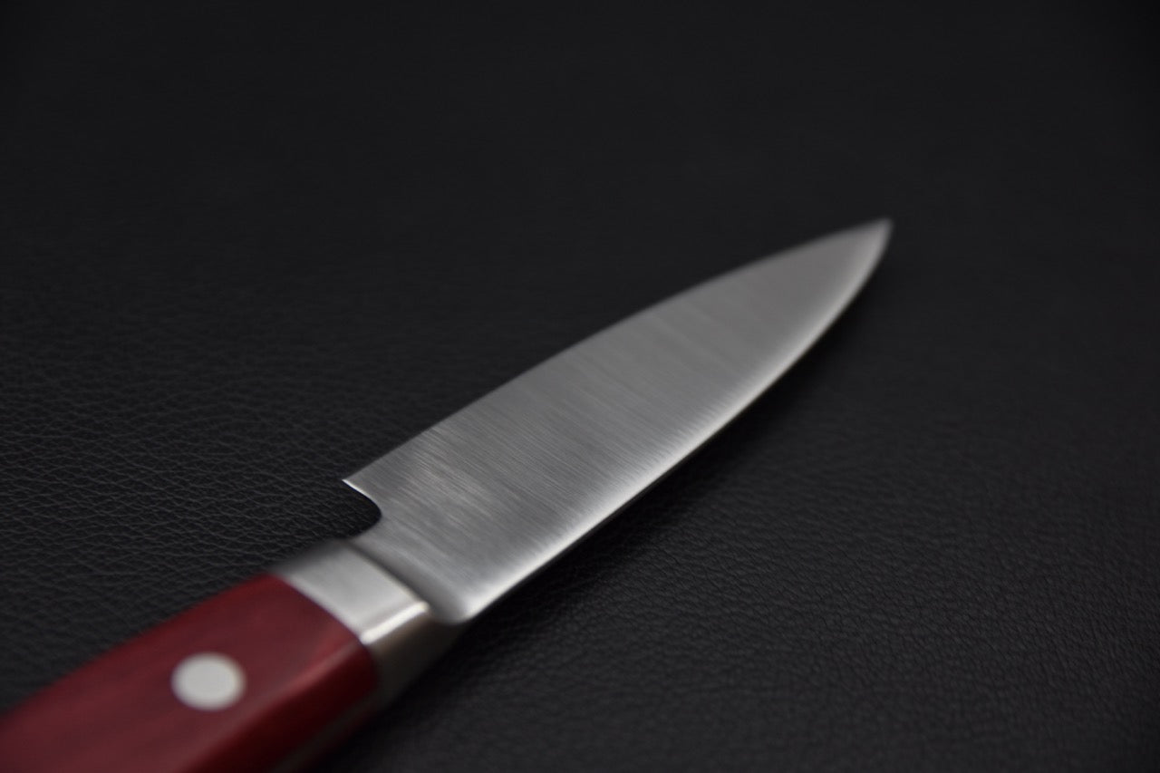 Couteau japonais 80 mm — jonction lame et manche, détail virole
