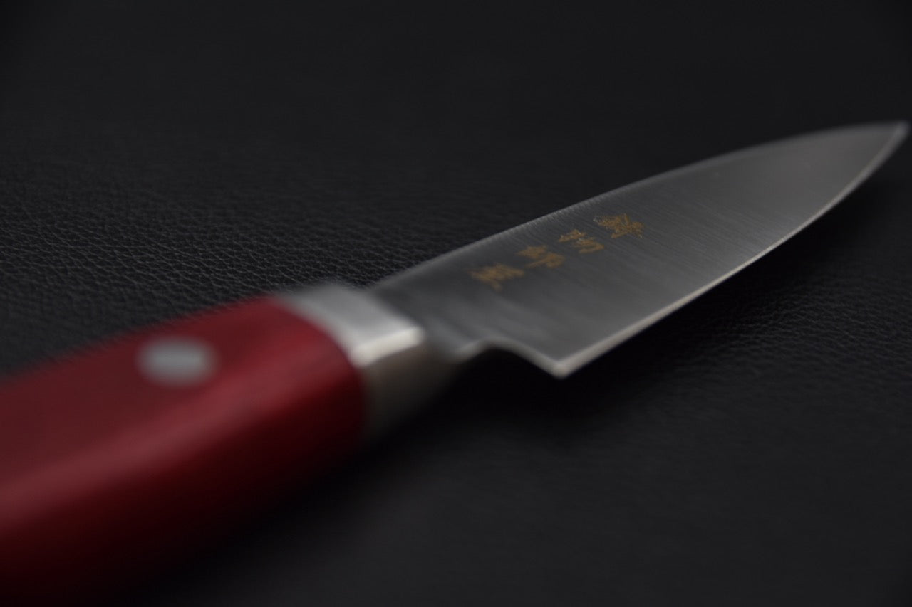 Couteau japonais 80 mm — vue complète sur fond neutre