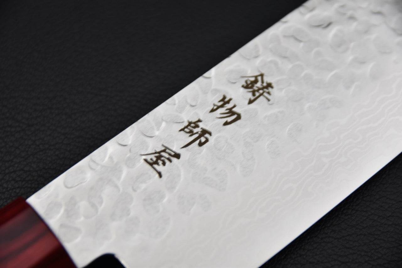 Nakiri japonais VG10 — détail de la finition tsuchime martelée sur le flanc de lame