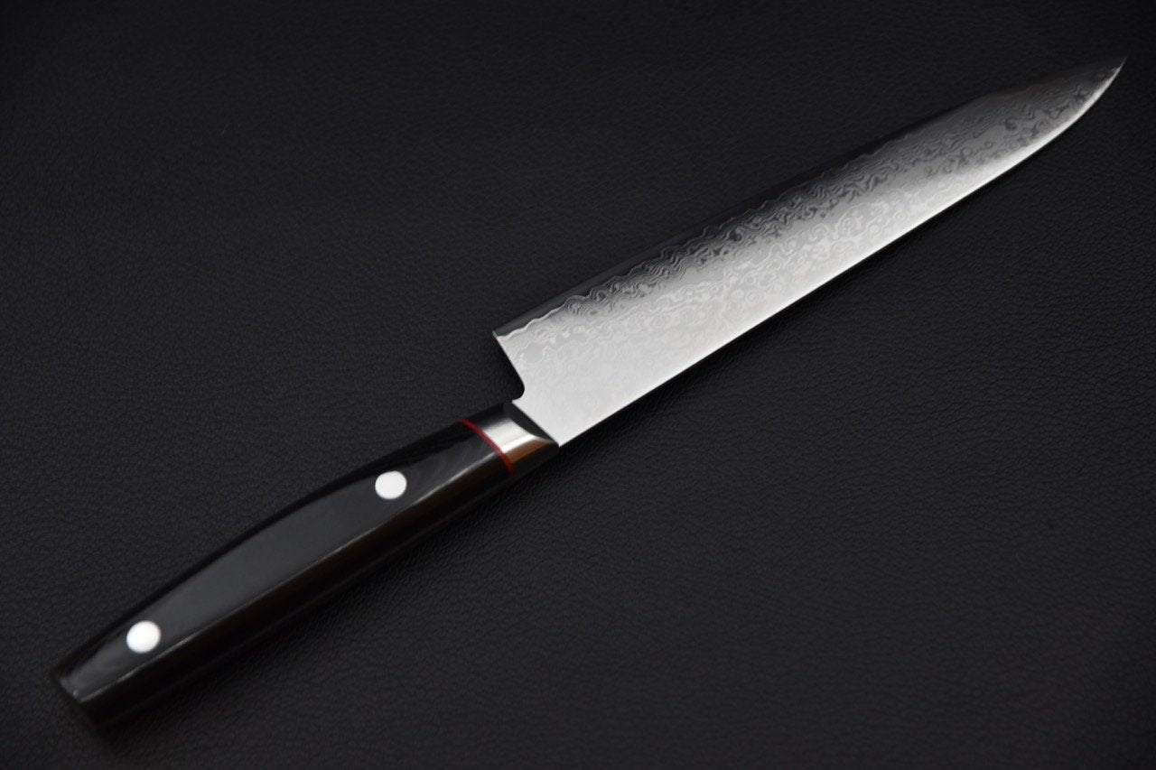 Couteau japonais avec lame damassée et manche noir