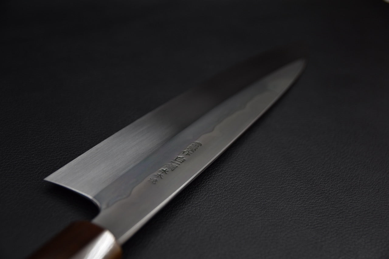 Couteau japonais gyuto 240 mm, manche en ébène vu de côté