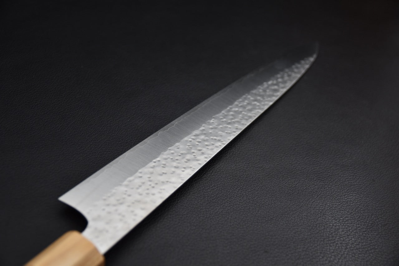 Sujihiki 270 mm SG2 — détail de la finition tsuchime vers la pointe