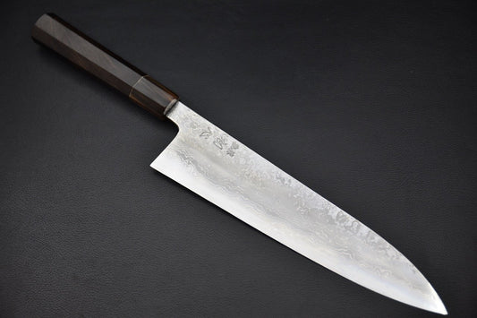 Couteau japonais Gyuto avec lame en Damascus et manche en ébène vu de côté
