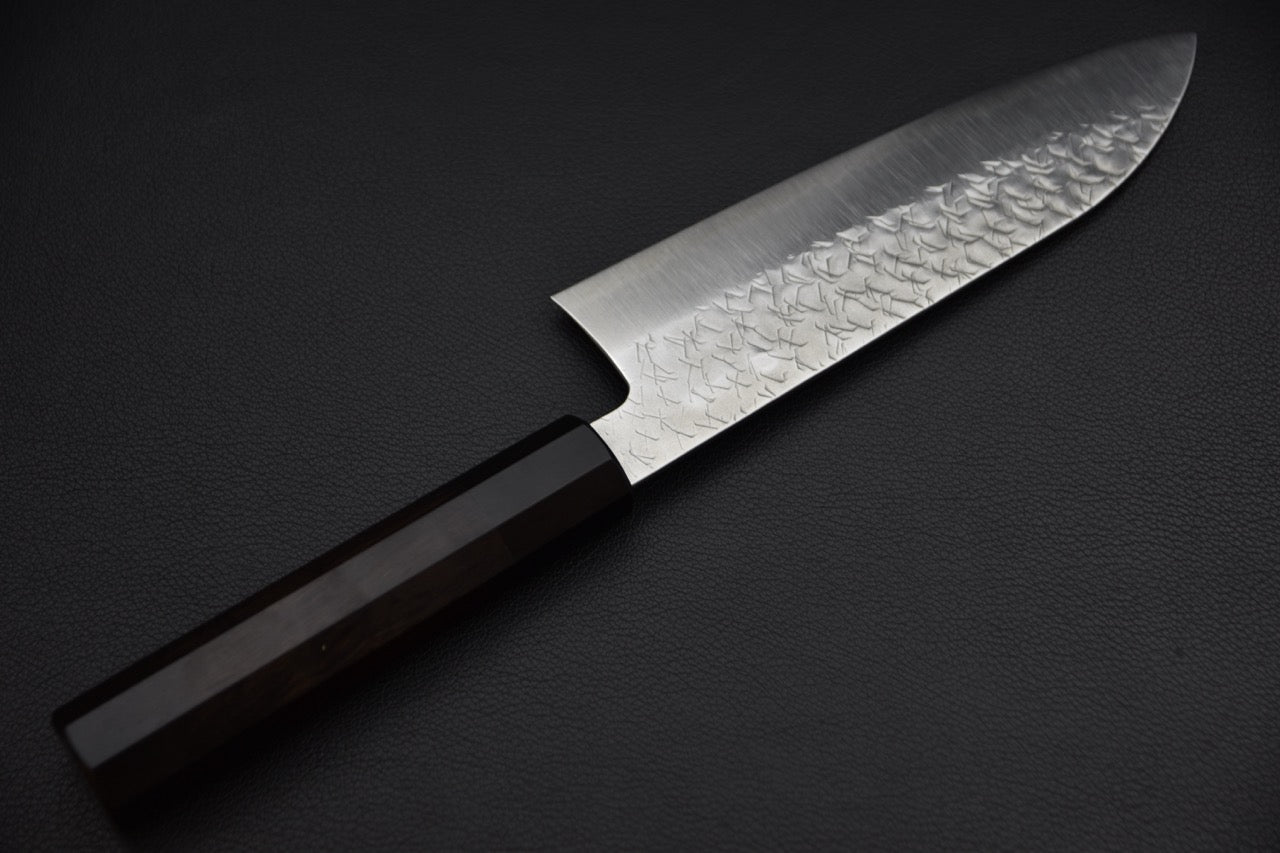 Nigara Hamono santoku 180 mm — vue de profil côté dos, manche en ébène et talon de lame