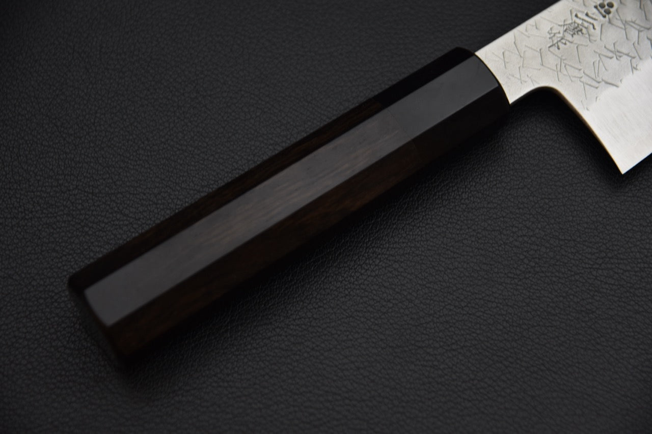 Nigara Hamono santoku 180 mm — détail du manche en ébène octogonal et de la virole