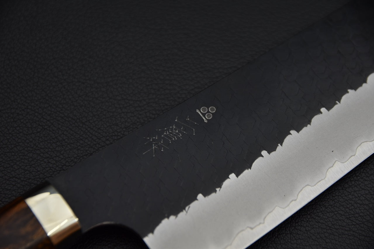 Couteau japonais nakiri SG2 — vue rapprochée du corps de lame et de la ligne hagane longeant le tranchant