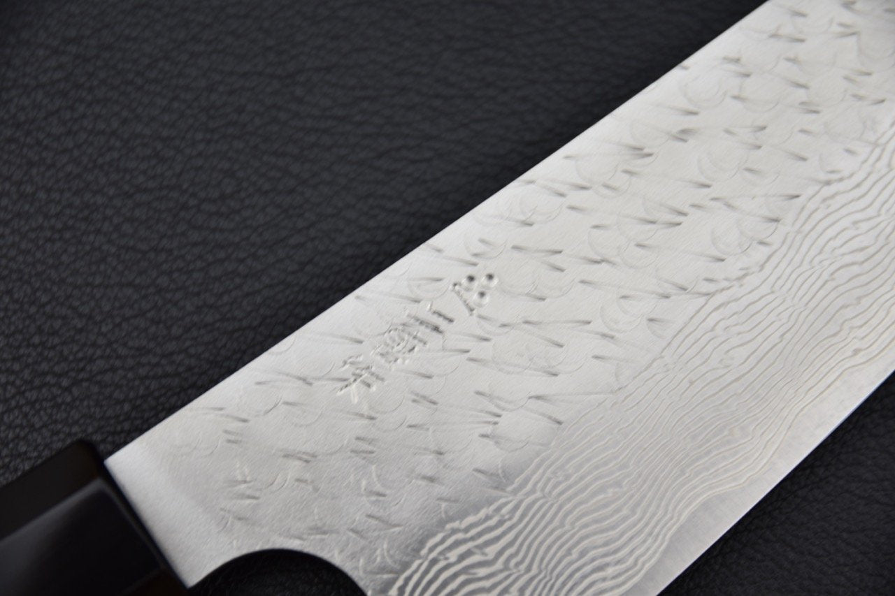 Couteau japonais avec lame damassée et inscriptions