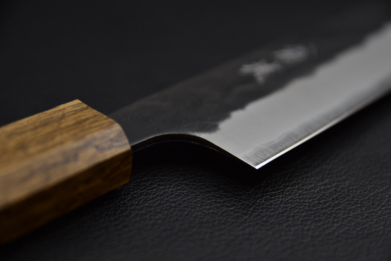 Couteau japonais sujihiki 270 mm — détail de la jonction manche et talon de lame, côté gauche