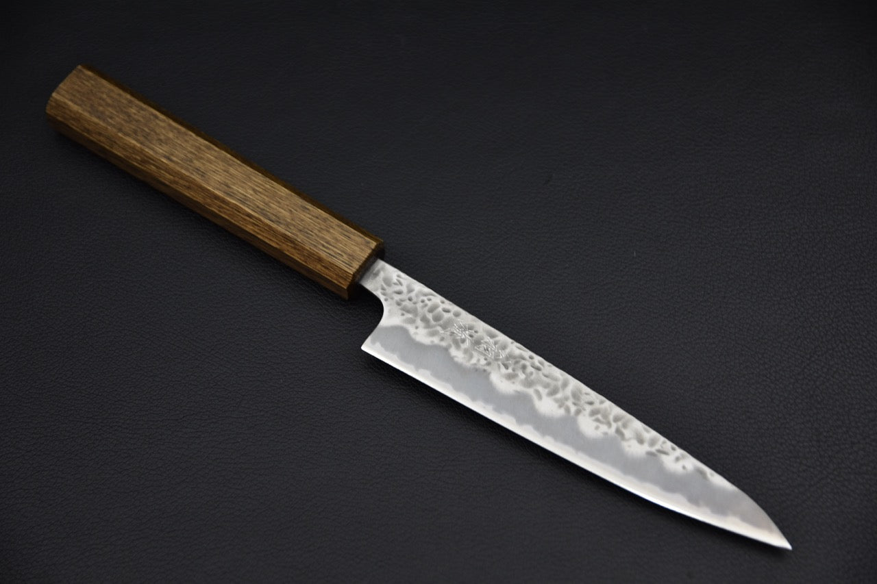 Couteau japonais petty 135 mm — vue complète de profil côté droit, manche wa octogonal en bois brun