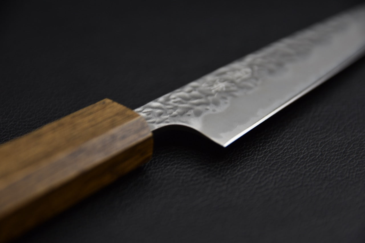 Couteau japonais petty 135 mm — vue de la jonction manche et lame, emmanchement direct