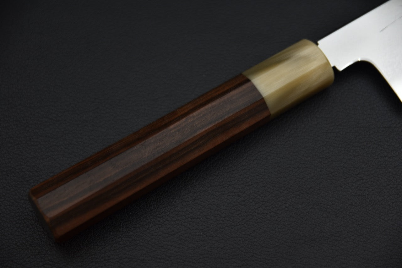 Tetsujin kiritsuke 240 mm — gros plan sur le manche wa en ébène octogonal et virole ivoire, couteau japonais