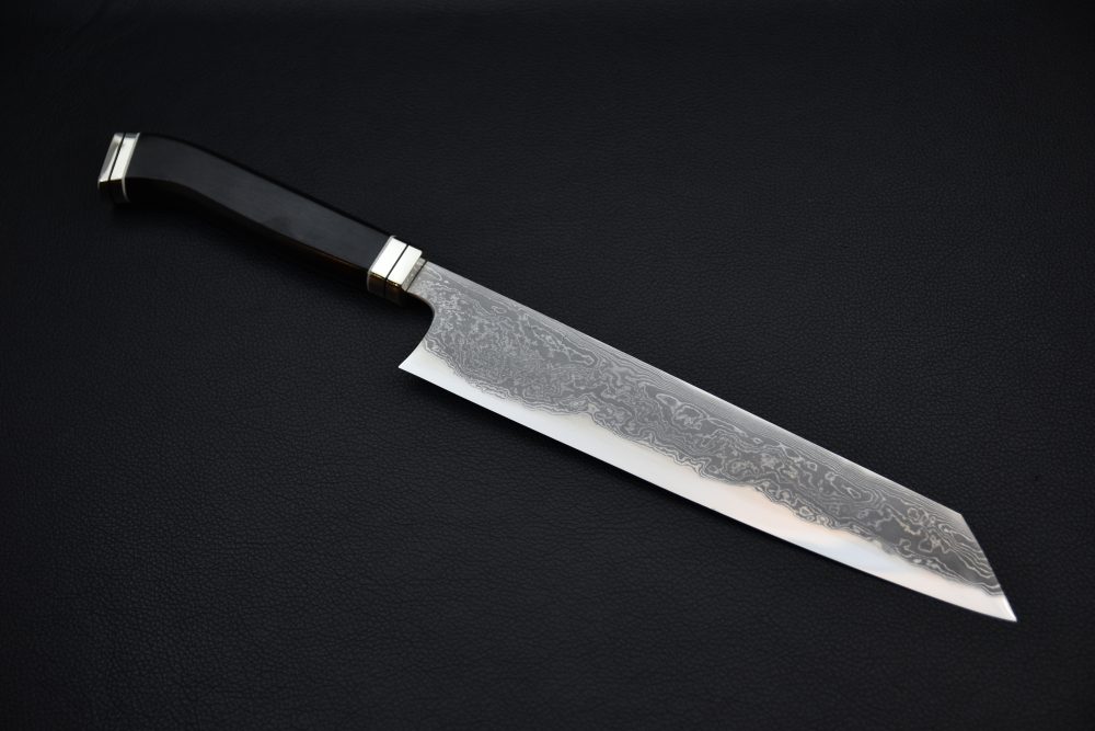 Hitohira Tanaka Kyuzo Aogami #1 Damascus Kiritsuke Gyuto 240mm Ébène Fusion