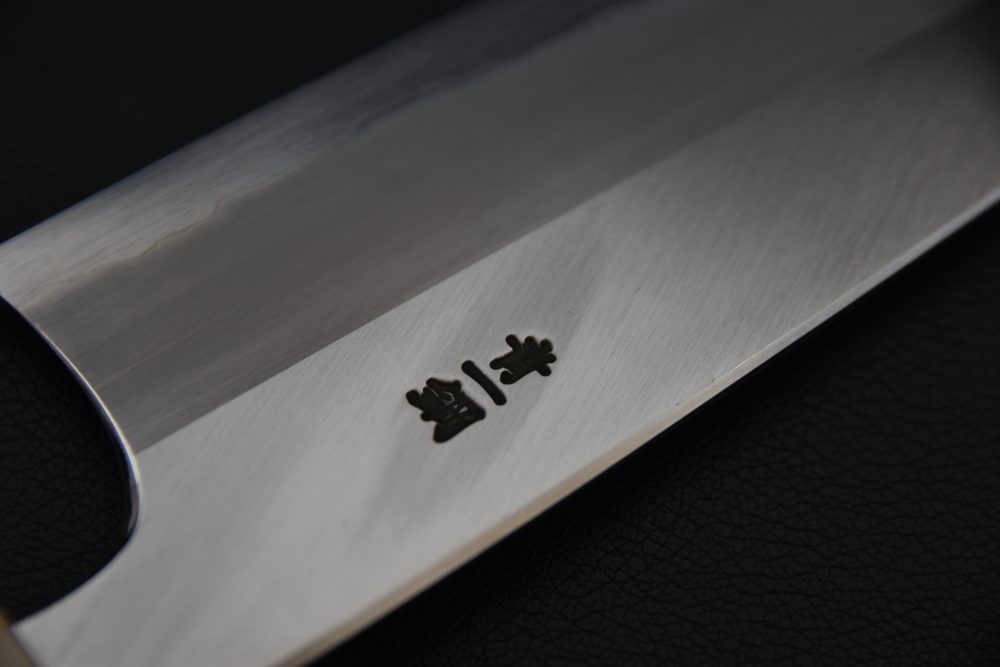 Hitohira Togashi Aogami #1 Migaki Santoku 180mm Taihei Makassar Ébène